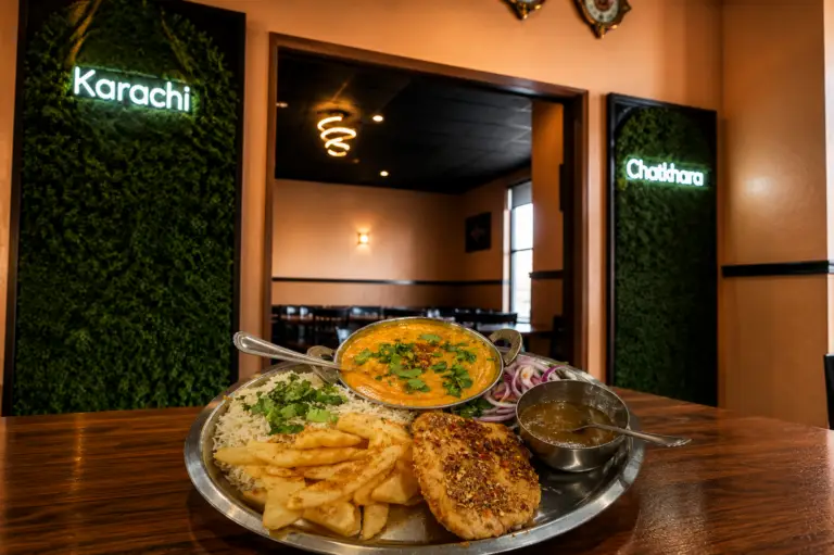 Balochi fish served with dal chawal and traditional Pakistani spices at Karachi Chatkhara Mount Prospect IL
